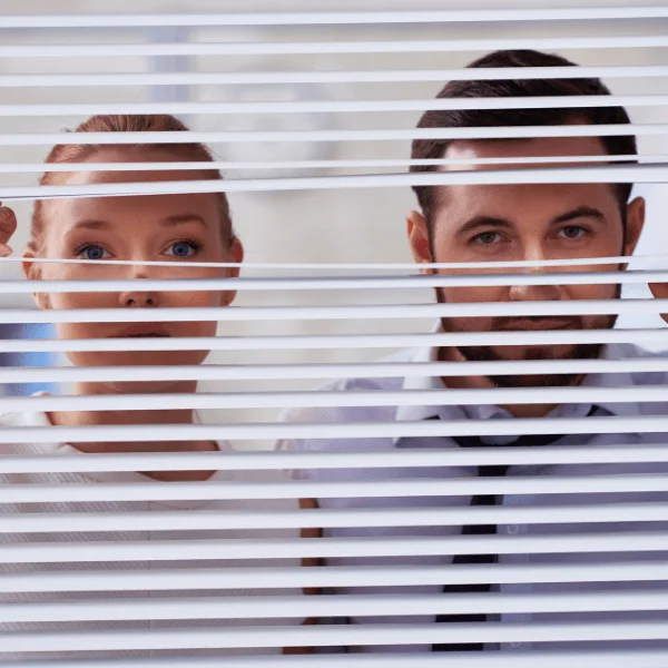 people starring through blinds invading someone's right to privacy