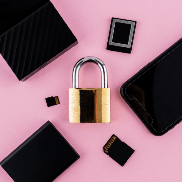 Lock with devices known for holding data around it, symbolising data protection