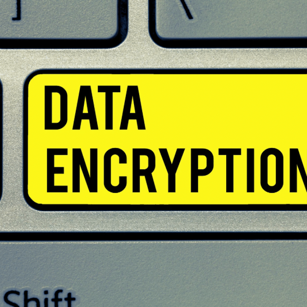 computer keyboard key with "data encryption" written on it