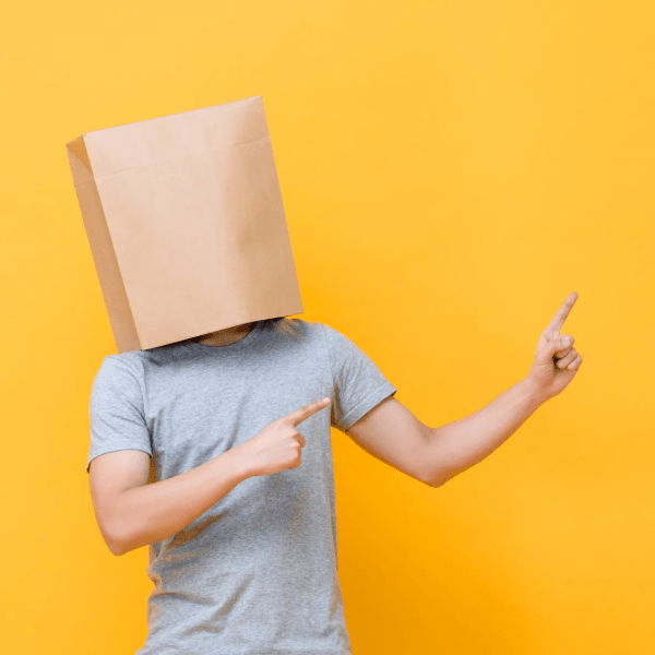 Man with a bag on his head, symbolising online anonymity